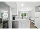 Cozy kitchen overlooking the dining area and features granite countertops at 6495 Titania Dr, Indianapolis, IN 46236