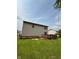 A spacious backyard with a wooden deck, perfect for outdoor entertaining and relaxation at 6611 Wandering Way, Indianapolis, IN 46241