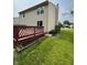 Backyard featuring a spacious wooden deck and lush greenery, perfect for outdoor entertaining at 6611 Wandering Way, Indianapolis, IN 46241