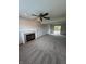 Spacious living room has fireplace and a sliding glass door to a deck at 6611 Wandering Way, Indianapolis, IN 46241