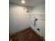 This utility closet has wood look flooring and wire shelving at 6611 Wandering Way, Indianapolis, IN 46241