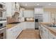 Beautiful eat-in kitchen with stainless appliances and custom cabinetry at 6733 Jons, Zionsville, IN 46077