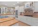 Kitchen with stainless appliances, custom cabinetry and tile backsplash at 6733 Jons, Zionsville, IN 46077