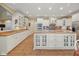 Spacious eat-in kitchen with custom cabinetry, tile floors, and modern appliances at 6733 Jons, Zionsville, IN 46077