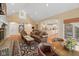 Inviting living room with vaulted ceilings, fireplace, and view into kitchen at 6733 Jons, Zionsville, IN 46077