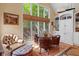 Comfortable living space with hardwood floors, large window, and a view of the backyard at 6733 Jons, Zionsville, IN 46077