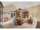 Spacious main bedroom with vaulted ceiling and cozy sitting area at 6733 Jons, Zionsville, IN 46077