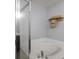 Bright bathroom featuring a soaking tub with shower doors and nice towel rack at 6848 Harriet Dr, Indianapolis, IN 46237