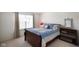 Bedroom with large window allowing an abundance of natural light to enter the room at 6848 Harriet Dr, Indianapolis, IN 46237