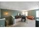 Spacious bonus room with a foosball table, bookshelf, and cozy seating area at 6848 Harriet Dr, Indianapolis, IN 46237