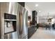 Spacious kitchen, stainless steel refrigerator with open concept design at 6848 Harriet Dr, Indianapolis, IN 46237