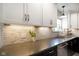 Kitchen counters and cabinets with stainless steel appliances at 6848 Harriet Dr, Indianapolis, IN 46237
