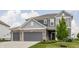 Attractive two-story home boasting a well-maintained lawn and a convenient two-car attached garage at 6902 Diamondleaf Way, Brownsburg, IN 46112