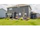 Beautiful backyard with patio, landscaping, and an expansive lawn at 6902 Diamondleaf Way, Brownsburg, IN 46112