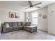 Comfortable upstairs living room featuring a cozy sectional sofa, and a ceiling fan for comfort at 6902 Diamondleaf Way, Brownsburg, IN 46112