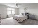Serene main bedroom with soft colors, large windows, and a cozy carpet at 6902 Diamondleaf Way, Brownsburg, IN 46112