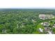 Aerial view of property highlighting landscaping and neighborhood features at 7502 Colony Cir, Indianapolis, IN 46260