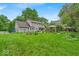 Well-maintained home exterior with a large yard and an outdoor gazebo at 7502 Colony Cir, Indianapolis, IN 46260
