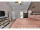 Comfortable main bedroom with vaulted ceilings, dual closets and a dresser at 7502 Colony Cir, Indianapolis, IN 46260