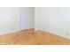 Bright bedroom offers parquet floors and a closet at 814 N Noble St, Greenfield, IN 46140
