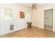 Bright breakfast nook area featuring wood table with storage, natural light, and tile flooring at 814 N Noble St, Greenfield, IN 46140