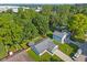 Aerial view of a residential home and neighborhood, showcasing lush greenery and a tranquil setting at 834 Delray Dr, Indianapolis, IN 46241