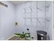 The laundry room features shelving and a plant at 834 Delray Dr, Indianapolis, IN 46241