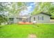 Inviting backyard featuring a spacious deck perfect for outdoor gatherings and relaxation at 8842 S Pleasure Valley Rd, Waldron, IN 46182