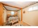 Warm bedroom with cozy decor, natural wood accents, and a relaxing atmosphere to unwind after a long day at 8842 S Pleasure Valley Rd, Waldron, IN 46182