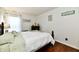 Bright bedroom with natural light, a comfortable bed, and clean white walls offers a peaceful ambiance at 9022 Hosta Way, Camby, IN 46113