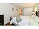 Spacious bedroom features a queen bed, closet, and modern decor, creating a serene and inviting space at 9022 Hosta Way, Camby, IN 46113