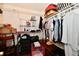 Walk-in closet offers ample storage with shelving, hanging racks, and space for luggage and accessories at 9022 Hosta Way, Camby, IN 46113