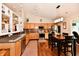 Bright eat-in kitchen with wooden cabinets, stainless steel appliances, and granite countertops at 9022 Hosta Way, Camby, IN 46113