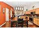 Well-lit kitchen featuring a dining area, stainless steel appliances, and ample cabinet space at 9022 Hosta Way, Camby, IN 46113