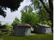This image highlights the property's storage capabilities with sturdy outbuildings at 94 N Routiers Ave, Indianapolis, IN 46219