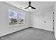 Bedroom with large window showcasing a spacious backyard and letting in natural light at 9724 Brooks Dr, Fishers, IN 46055