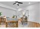 Chic living room showcasing four chairs, opening into an adjacent space with a doorway at 9724 Brooks Dr, Fishers, IN 46055