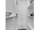Walk-in pantry with white shelving offers ample storage space for an organized kitchen at 9724 Brooks Dr, Fishers, IN 46055