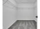 Empty walk-in closet with gray carpet, white walls, and wire shelving at 9724 Brooks Dr, Fishers, IN 46055