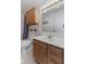 Well-lit bathroom featuring neutral finishes, vanity with cabinets and a shower/tub combo at 1016 W Creek Ridge Dr, Fountaintown, IN 46130