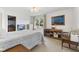 Comfortable bedroom featuring a desk area, closet, and view of the outdoors at 1016 W Creek Ridge Dr, Fountaintown, IN 46130
