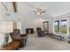 Spacious living room with vaulted ceilings, ceiling fan, and lots of natural light at 1016 W Creek Ridge Dr, Fountaintown, IN 46130