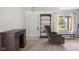 Inviting living room with cozy recliner and large window with views of the outdoors at 1016 W Creek Ridge Dr, Fountaintown, IN 46130