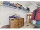 Spacious walk-in closet with ample shelving and a dresser for organization at 1016 W Creek Ridge Dr, Fountaintown, IN 46130