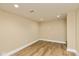 This partially finished basement has new pot lights and natural light at 1122 W 35Th St, Indianapolis, IN 46208