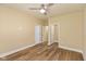 A spacious bedroom with a ceiling fan and dual closets is ready for move in at 1122 W 35Th St, Indianapolis, IN 46208