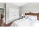 Comfortable bedroom featuring wood floors and a double closet at 1165 Maclaren Ct, Franklin, IN 46131