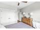 Comfortable bedroom with closet, dresser and ceiling fan at 1165 Maclaren Ct, Franklin, IN 46131