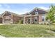 Beautifully landscaped two-story home with a well-manicured lawn at 1165 Maclaren Ct, Franklin, IN 46131