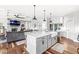 Bright and airy kitchen featuring a large center island, modern appliances, and an open-concept design at 1165 Maclaren Ct, Franklin, IN 46131